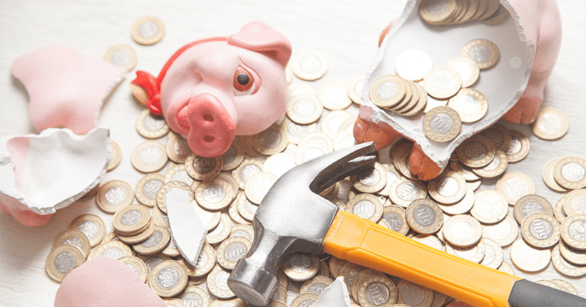 Smashed Piggy Bank with hammer